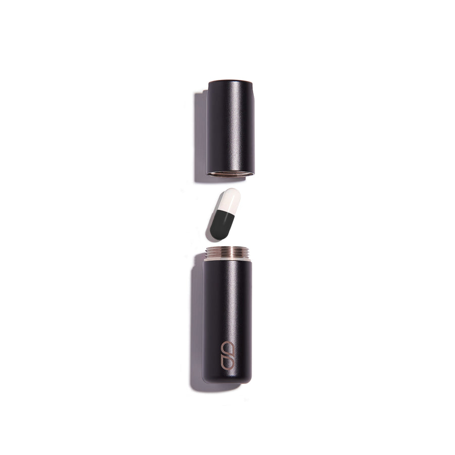 Screw top for easy access to the stylish, durable and waterproof pill case. Simply unscrew and add up to 6 / six large tablets to keep you going wherever your day takes you. Sustainable and made from stainless steel. Percentage of profits going to cancer research charities. Available in four colours: Jet Black, Cosmic Grey, Lavender and Flamingo Pink. See more at we are tabuu, www.wearetabuu.com