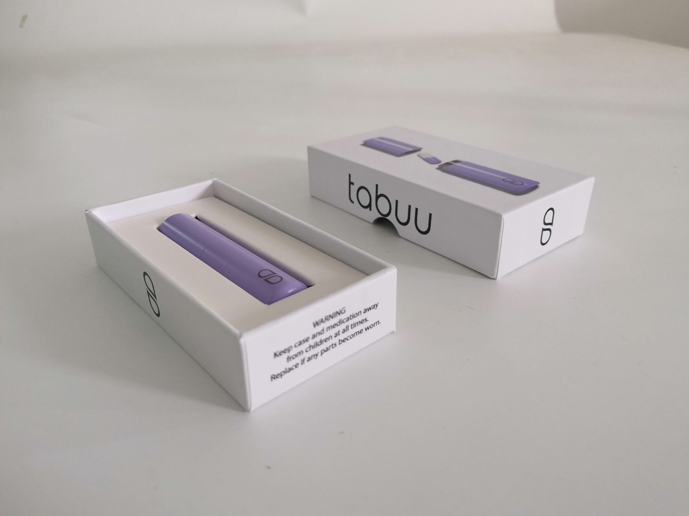 Lavender Tabuu cases in an early white box